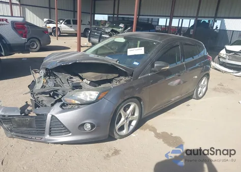 2014 Ford Focus Titanium z USA, uszkodzony, nr VIN 1FADP3N26EL330178